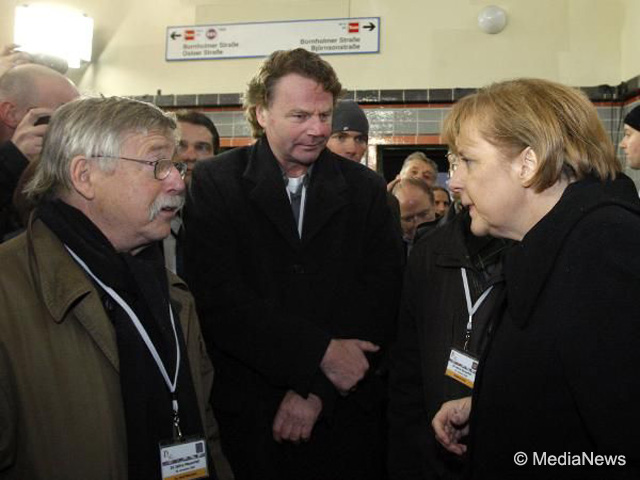 Siegbert Schefke mit Angela Merkel und Wolf Biermann
